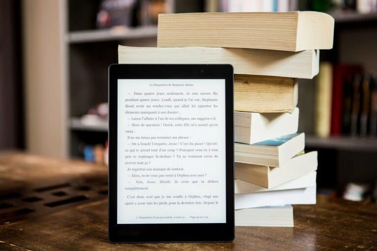 ereader with books on table